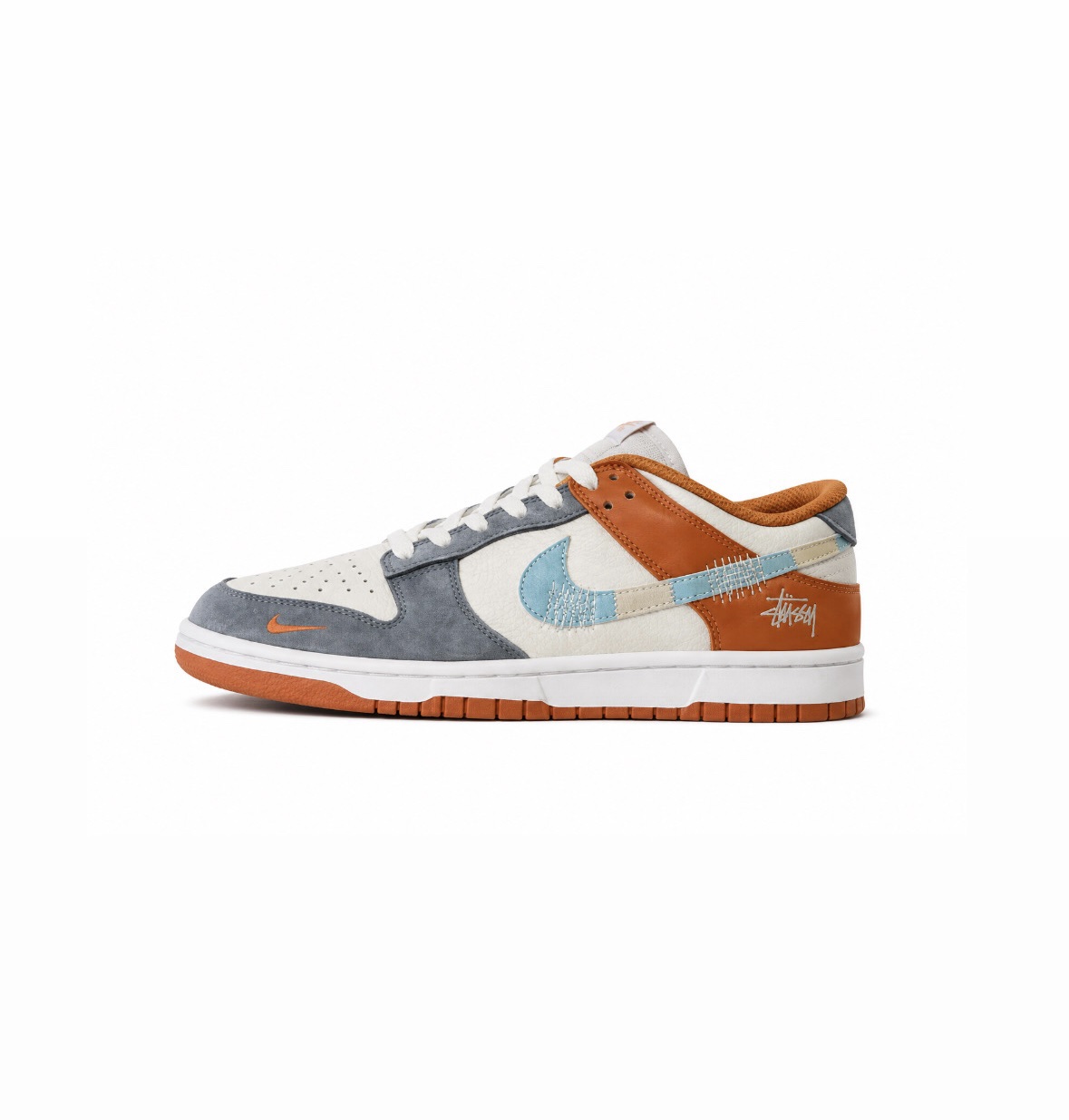 SB Dunk Low x Stussy “Grey Orange”